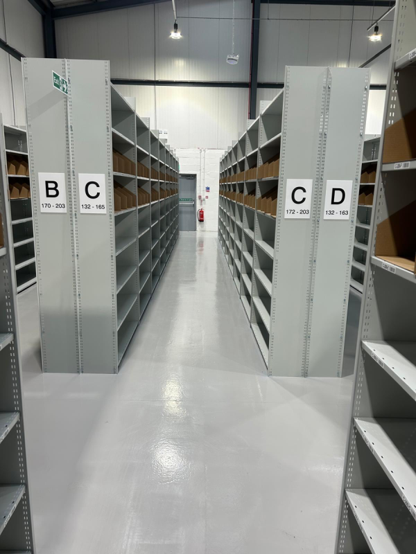 Storage Aspects - Book Aid International - Shelving with signage in place