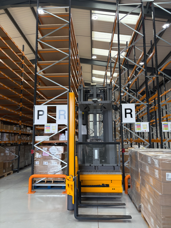 Storage Aspects - Book Aid International - VNA Pallet Truck in use